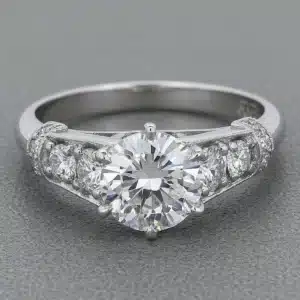 GIA certified 1.57ct natural round diamond engagement ring in platinum 950 with cathedral setting, diamond shoulders, and vintage-inspired design.