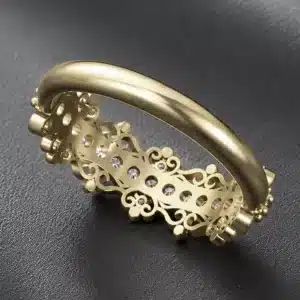 heirloom inspired yellow gold diamond band with vintage scroll design and natural diamonds